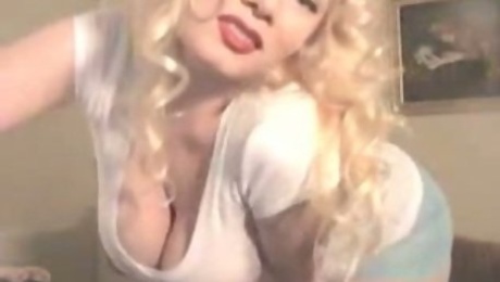 Awesome busty blonde milks her lactating tits in front of a