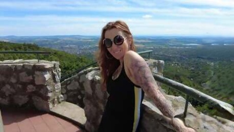 Tattooed Mom is hiking in the woods. She enjoys summer and outdoor nudity