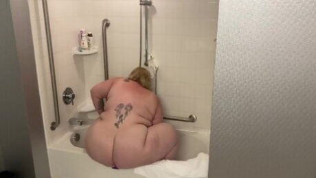 Fucking myself using the bathtub!